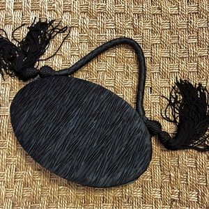 Black pleated satin evening clutch